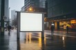 blank billboard in an urban setting at night, surrounded by the ambient city lights and modern architecture, creating a striking visual for passersby