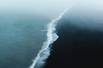 Aerial and moody view of the Reynisfjara Black Beach of Vik,  Iceland