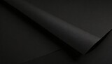 Fototapeta  - close up of a sheet of black paper with folds