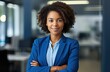 © Lars - Happy young african american woman business professional in office smiling