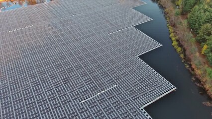 Wall Mural - Solar panels float on lake water for environmentally friendly generation of electricity