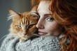 Woman with a ginger cat
