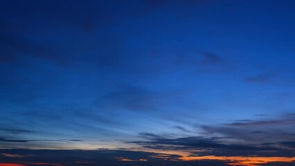 Wall Mural - Sunrise sky timelapse, watch as the sky evolves from darkness to brilliance in a captivating time-lapse, where clouds race across the canvas of dawn, creating a stunning sunrise.
