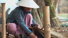 Title Asia Life Old Femen Grandmother Working In Outdoor. Old Lady Elderly Serious Living In The Countryside Of Life Rural People In Thailand . Weaving Material Grass Roof Groof Bamboo Making.