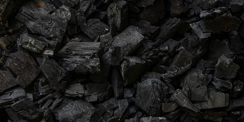 black coal background. charcoal woody black.  lot of wood