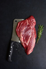 Wall Mural - Raw organic marbled beef steak with ingredients for cooking. Top view with copy space.