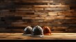 Three hard hats on a wooden table
