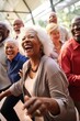 A group of elderly people are laughing and dancing together