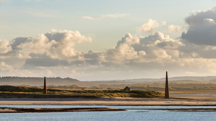 Wall Mural - Stunning dramatic landscape image of Lindisfarne, Holy Island in Northumberland England during Winter