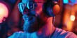 © Fotograf - A man with a beard wearing headphones. Perfect for music lovers or professionals in the audio industry