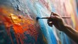 © Fotograf - Close up of a person's hand holding a paintbrush. Can be used for creative projects or art-related themes