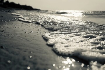Poster - A captivating black and white photo of the ocean. Perfect for adding a touch of elegance and tranquility to any project