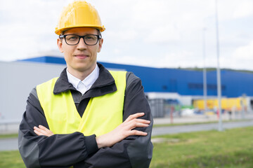 Poster - Portrait of engineer in helmet and glasses.