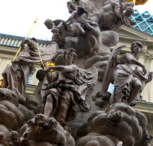 Vienna. Austria. March 17, 2019. Plague Column Or Trinity Column Is A Holy Trinity Column Located On The Graben. Erected After The Great Plague Epidemic In 1679. Religious Motifs Of Sculptures.