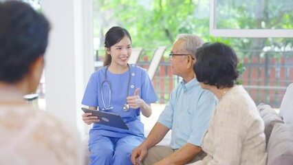 Wall Mural - Close up Asian nurse or doctor use tablet to consult and give assistant to group of senior people in living room of clinic or hospital in senior healthcare center.