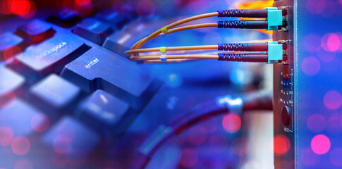 Poster - network hardware. keyboard near internet wires. network equipment with fiber optic cable. concept se