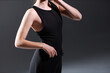 © Сергей Луговский - A part of female torso in black dress