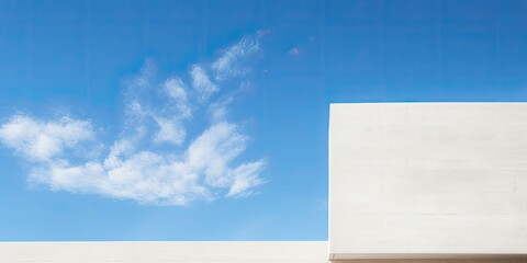 Minimal modern architecture, with a white cement exterior and an open window against a blue summer sky and clouds, featuring a concrete wall texture.