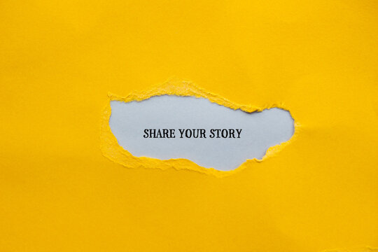 Share your story lettering on ripped yellow paper with gray background. Conceptual photo. Top view, copy space for text.