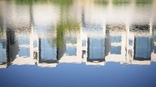 Reflection Of Modern Building On Water