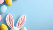 Easter Party Banner From Top View With White Bunny Ears, Flowers and Eggs on Pastel Blue Background