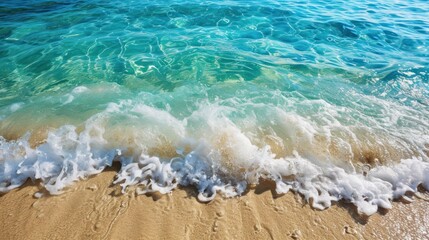 Poster -  a sandy beach with a wave coming in to the shore and a blue body of water on the other side of the beach.