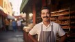 © Krtola  - Mexican middle age male standing in front of bakery