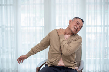 Asian elderly senior man problem Shoulder pain. Health problems of the elderly Body pain, congenital disease, arm pain. Retirement unhealthy and stress.