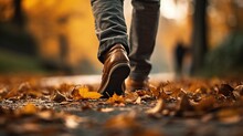Cinematic Close-up, A Person's Shoes Stepping On Autumn Leaves