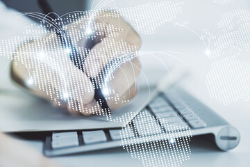Poster - Double exposure of abstract digital world map with connections and hand writing in notebook on background with laptop, research and strategy concept