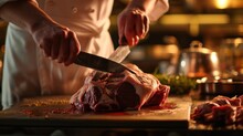  A Person Cutting Up A Piece Of Meat On A Cutting Board With A Knife And A Pot Of Spices In The Background.