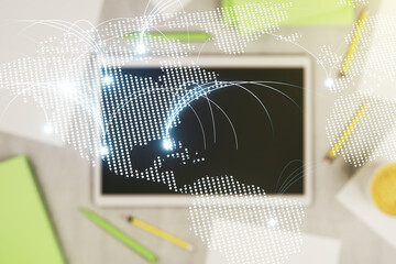 Poster - Double exposure of abstract digital world map with connections and digital tablet on background, top view, research and strategy concept