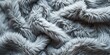 Close-Up of Furry Blanket: An image featuring the soft and cozy texture of a furry blanket.