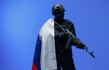 Wall Mural - Modern Russian soldier in uniforms on background of Russia flag with weapon gun. Military recruitment concept