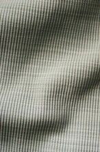 Vertical Of A Gray Woven Wavy Fabric Background