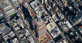 Fototapeta Nowy Jork - Panoramic Aerial Shot Around the Top of the Empire State Skyscraper in New York City. Helicopter View of the Spire, Viewing Platform with Tourists, Indoors Top Deck Observatory 