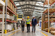 © Halfpoint - Engineers walking with foreman in modern industrial factory, talking about new production project or investment. Team management in manufacturing facility.