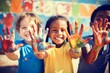 © Yuliia - Happy diverse children raising painted hands kindergarten child kids playing playful joyful enjoying colorful paint inclusion concept school art education preschool illustration creativity creative