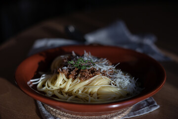 Canvas Print - Bolognese pasta with herbs and parmesan