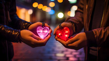 A Cute Couple Holding Colorful Heart Design Candles In Their Hands On Valentine Day 