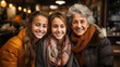 Portrait of two teenage sisters with their grandmother in a restaurant. Granddaughters. Photo of happy family. Family love. Family ties. Concept of love, affection, advice, stories, bonds, hugs.
