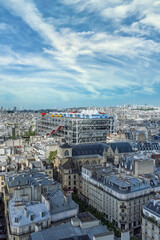 Wall Mural - Paris, aerial view of the city, with the Pompidou center, and the Defense in background
