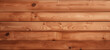 Uneven cedar planks in horizontal orientation; natural wood grain knotted background