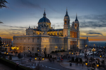 Madrid, Spain 28-12-2022 The Almudena Cathedral during a colorful sunset, it is the most important  and Catholic religious building in Madrid and a visit is free of charge except for the crypt  