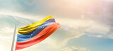 Fototapeta  - Venezuela national flag cloth fabric waving on the sky - Image