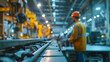 machinery in an assembly line at an industrial facility, in the style of bokeh panorama, dramatic atmospheric perspective, back button focus, oversized objects, dark yellow and light indigo, distresse
