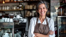 A Joyful Lady Stands In Her Cozy Kitchen, Adorned In A Warm Brown Apron As She Smiles With Delight While Browsing The Shelves Of Her Favorite Store For The Perfect Coffee And Food To Share With Loved