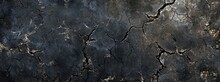 Textured Black Cracked Surface, Perfect For Backgrounds In Edgy, Industrial Design Or To Convey Concepts Of Breakage And Resilience.