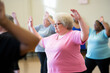 A diverse multiracial group of active, overweight elderly people enjoy participating together in an indoor gymnastics class to improve their physical condition, well-being, and lead a healthy lifestyl