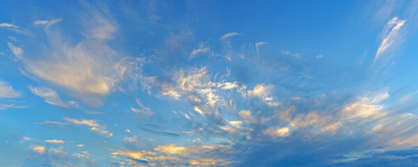 Poster - White clouds on the blue sky.